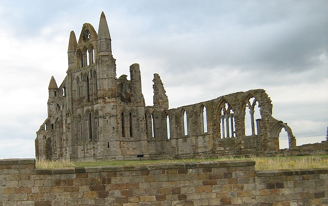 The ruins of Whitby Abbey, set against a grey sky